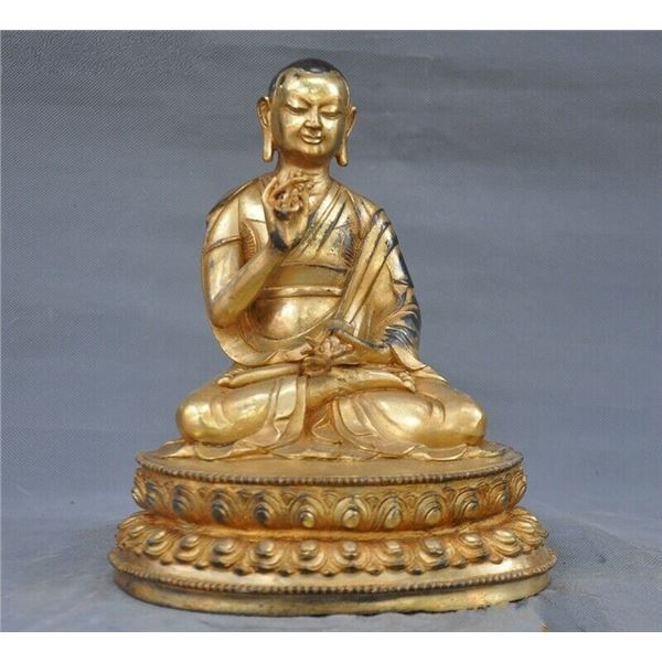 A GILT BRONZE GURU LAMA BUDDHA FIGURE QING DYNASTY.