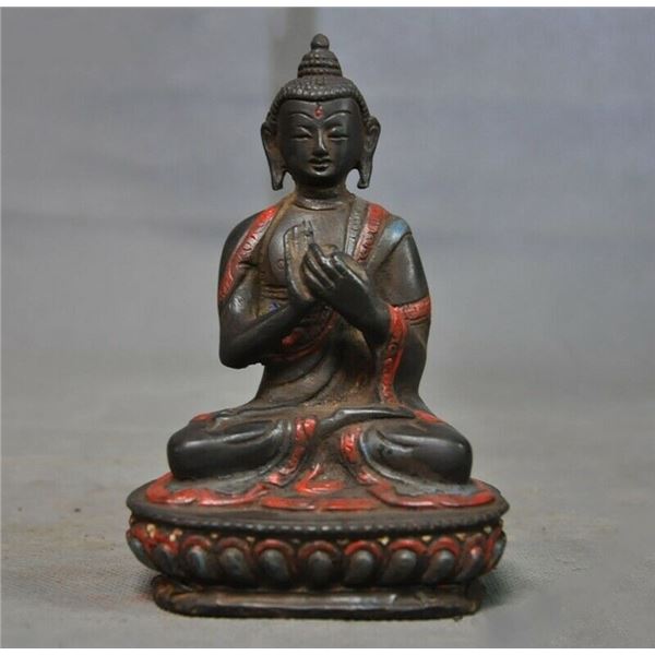 A BRONZE PAINTED SHAKYAMUNI BUDDHA FIGURE QING DYNASTY.