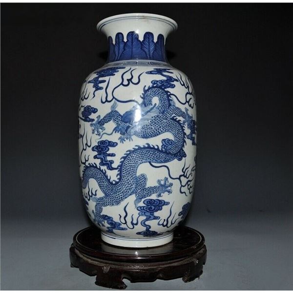 A BLUE AND WHITE DRAGON VASE KANGXI MARK.