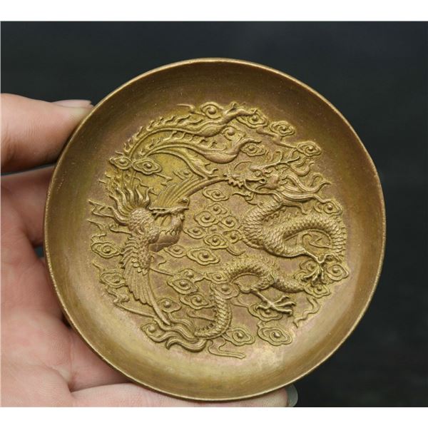 A BRONZE DRAGON AND PHOENIX PLATE QING DYNASTY.