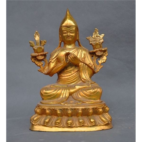 A GILT BRONZE GURU LAMA BUDDHA FIGURE QING DYNASTY.