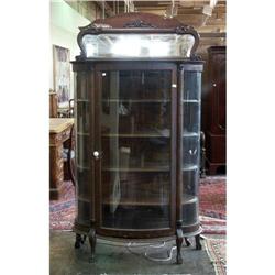 EARLY 20TH CENTURY OAK CURVED GLASS CHINA CABINET