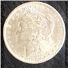 Image 1 : 1900 uncirculated Morgan Silver Dollar.