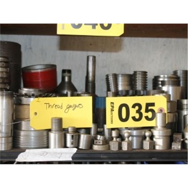SHELF OF VARIOUS THREAD GAUGES