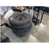 Image 1 : 2 WINTERMARK P235/75R15 TIRES ON 5 BOLT RIMS MUD AND SNOW TIRES