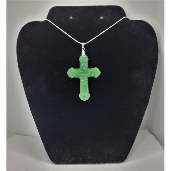 10)  CARVED GREEN LAB CREATED JADE CROSS ON