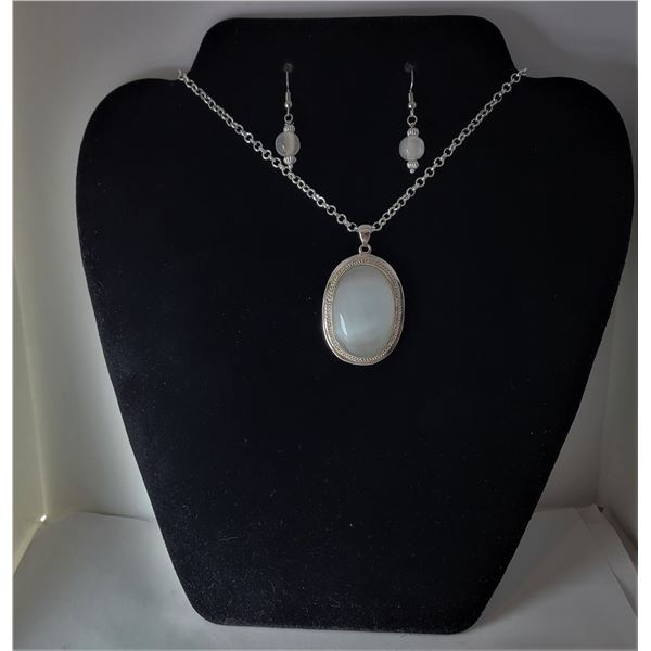 11) OVAL 40 X 27 MM NATURAL WHITE CAT'S EYE