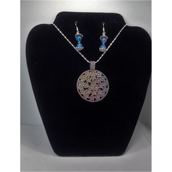 26)  ROUND RAINBOW COLORED FLOWER CARVED