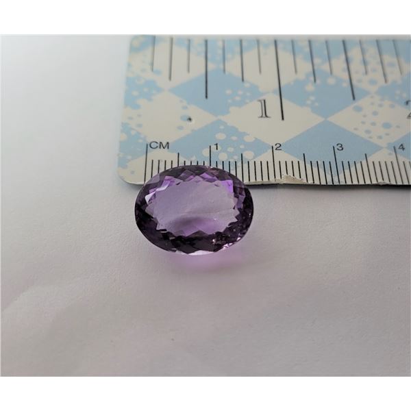23)  NATURAL OVAL 12 CT PURPLE AMETHYST