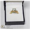 Image 1 : GOLD TONE SOLITAIRE RING APPROX SIZE 7