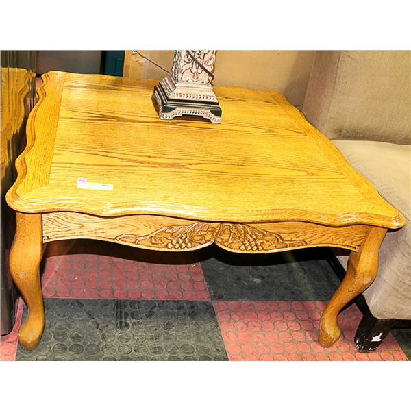 SOLID WOOD GOLDEN OAK COFFEE TABLE WITH CARVED