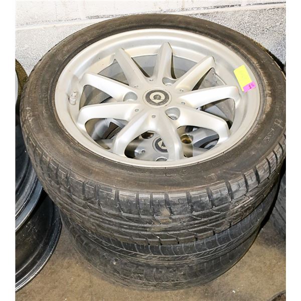 LOT OF TWO 3 BOLT ALUMINUM RIMS WITH BRIDGESTONE