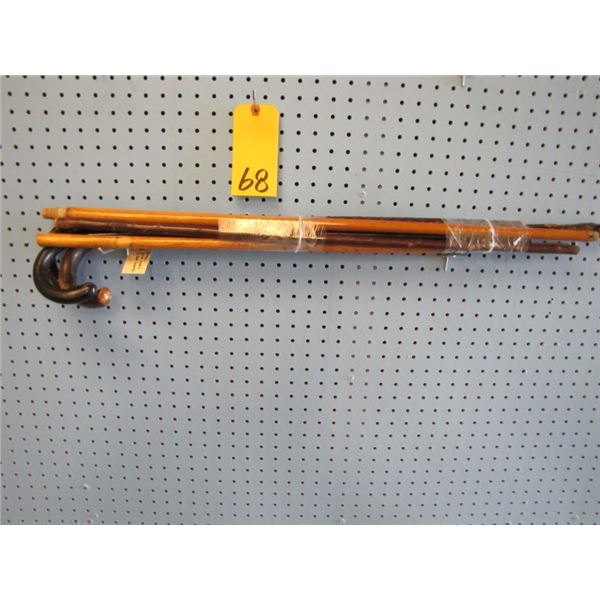 bundle of three old wooden canes and three cane shafts