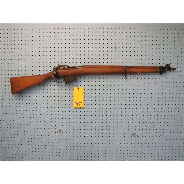 Lee Enfield number 4, bolt action, 303 calibre, fullwood, not original clip. was originally a 22 cli