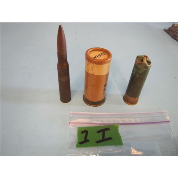 lot with 50 calibre, flare White, shotgun style round stamped London rest unreadable