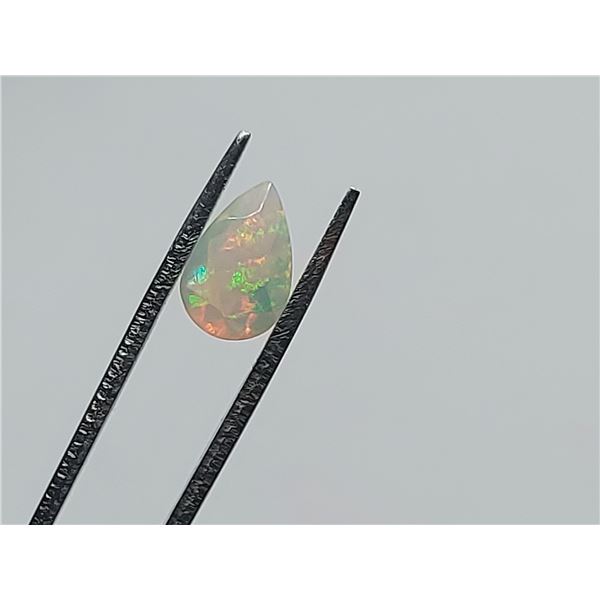 0.94 ct. SPARKLING RAINBOW FACETED WELO OPAL