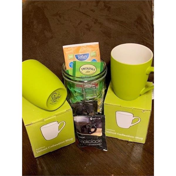 2 Steeped Tea Mugs and container of asssorted teas and hot chocolate