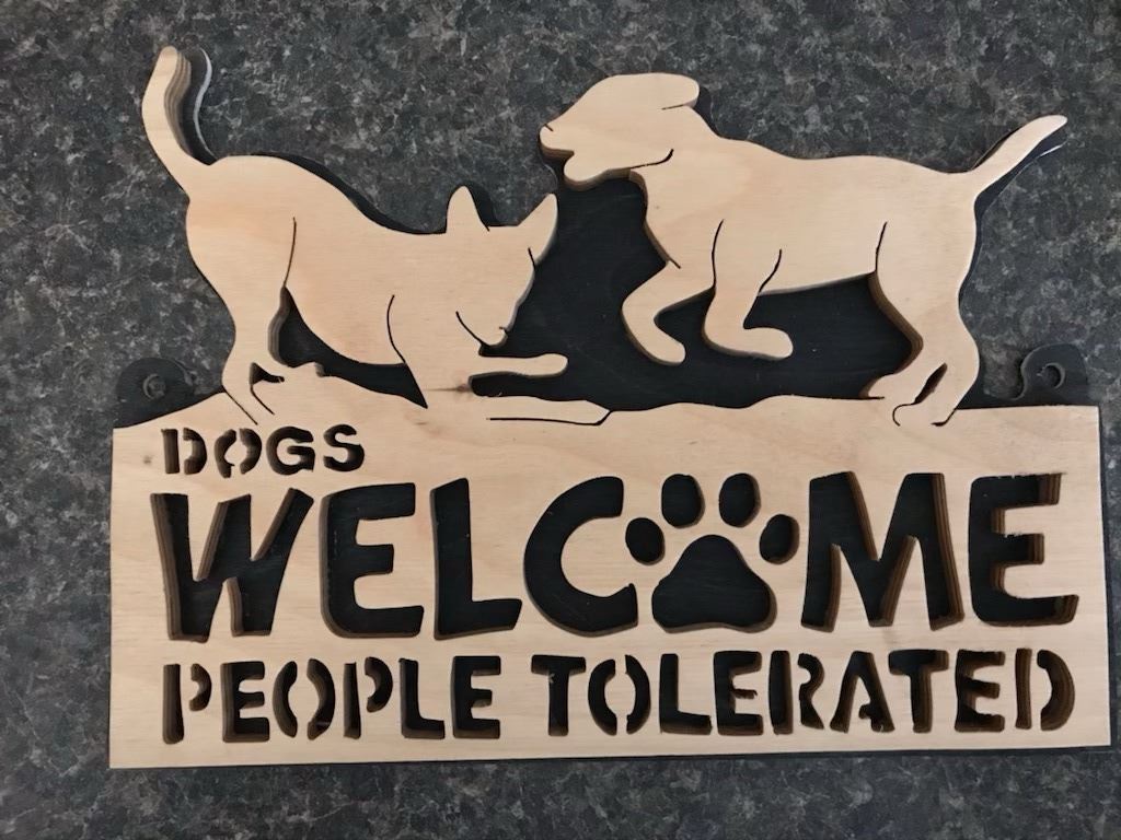 Wood scroll work welcome sign