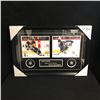 Image 1 : SIDNEY CROSBY & NATHAN MACKINNON DUAL-SIGNED PUCK FRAME (FRAMEWORTH COA)