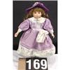 Image 1 : Porcelain Doll in Purple Dress