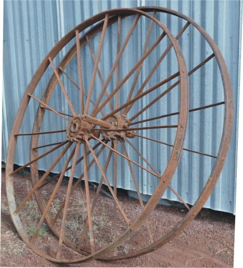 2 antique steel rake wheels