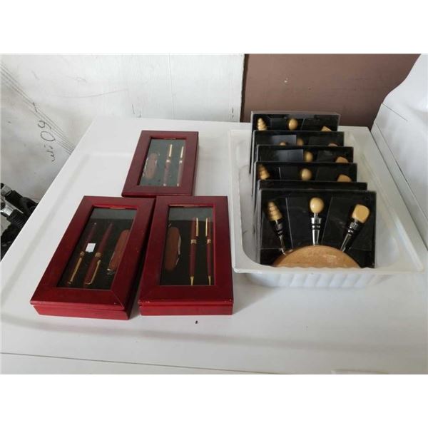 Three new pencil and pocket knife sets with new wine cork sets