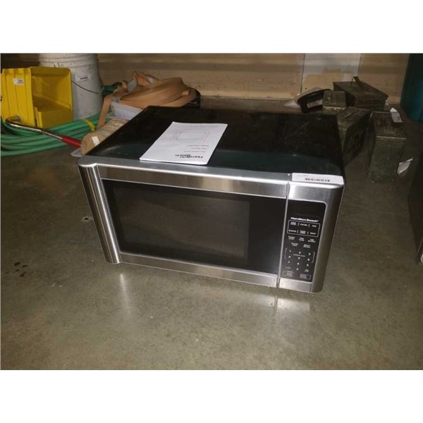 As new hamilton beach microwave oven EM031MC1 - 11 1/2 INCHES TALL X 21 INCHES WIDE X 16 INCHES DEEP