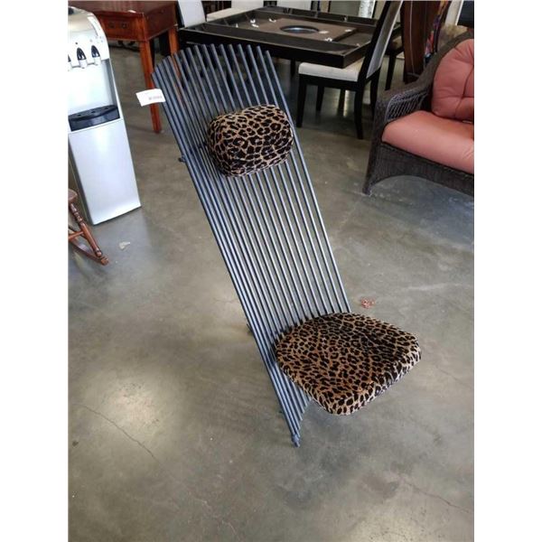 HEAVY METAL DESIGNER CHAIR WITH LEOPARD PRINT CUSHION AND HEADREST