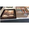 Image 1 : Box of DVDs and creek picture