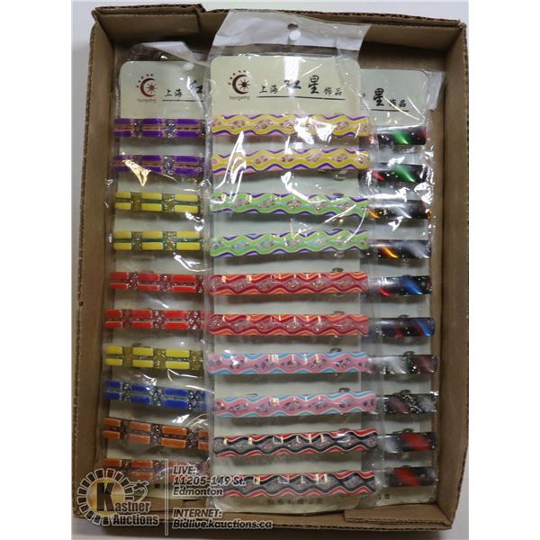 BOX WITH PACKAGES OF VINTAGE BARRETTES