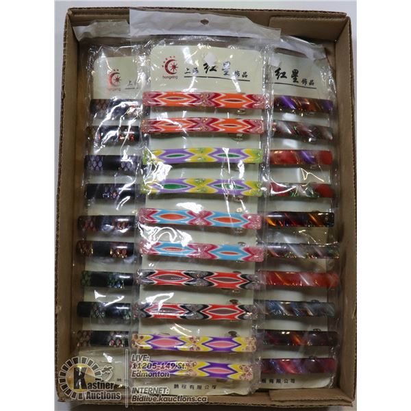 BOX WITH PACKAGES OF VINTAGE BARRETTES