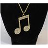 Image 1 : UNISEX MUSIC SYMBOL NECKLACE GOLDCFILLED