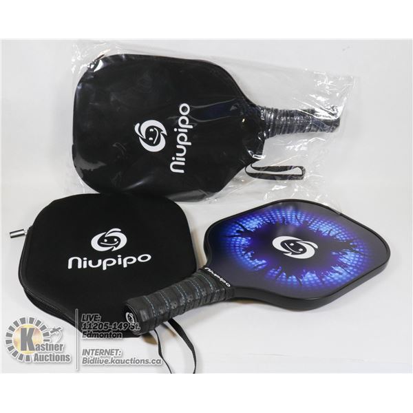 PAIR OF NIUPIPO RACKETS WITH COVERS