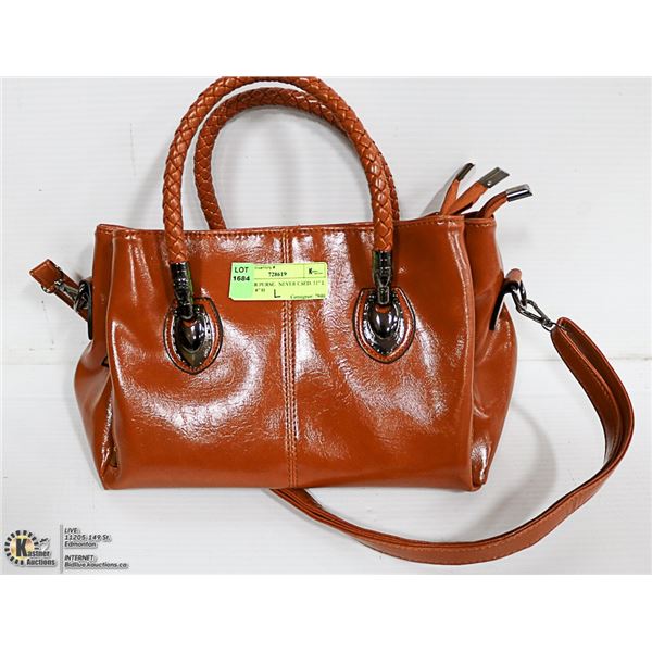 LEATHER PURSE.  NEVER USED. 11” L X 5” D X 8” H