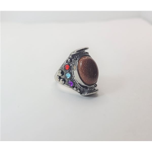 22)  SILVER TONE & OVAL NATURAL GOLDSTONE STATEMENT RING WITH COLORED CZ ACCENTS ON THE SHOULDERS,  