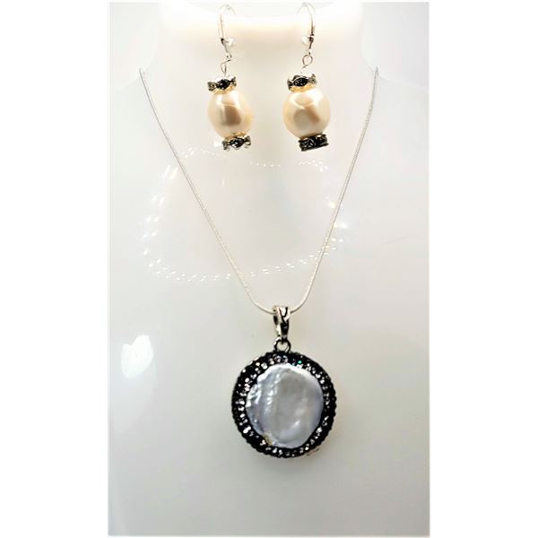 28)  NATURAL MOTHER OF PEARL ROUND PENDANT WITH CLEAR & BLACK TRIPLE  ROWS OF CZ  SET IN TIBETAN SIL