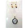 Image 1 : 28)  NATURAL MOTHER OF PEARL ROUND PENDANT WITH CLEAR & BLACK TRIPLE  ROWS OF CZ  SET IN TIBETAN SIL