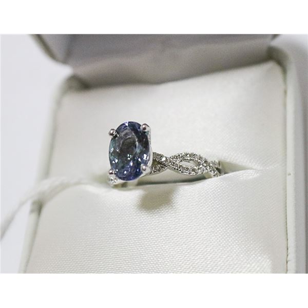 2.18 CARAT OVAL TANZANITE AND DIAMOND RING -(1)