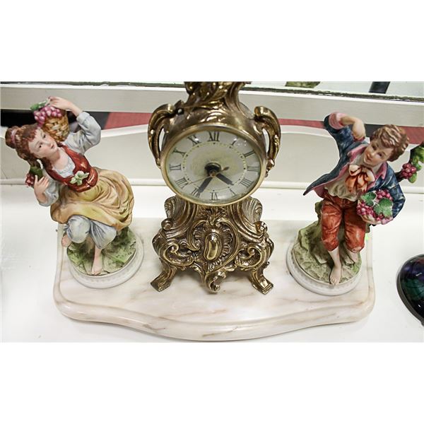 EUROPEAN BRASSTONE CLOCK ON MARBLE BASE WITH BOY