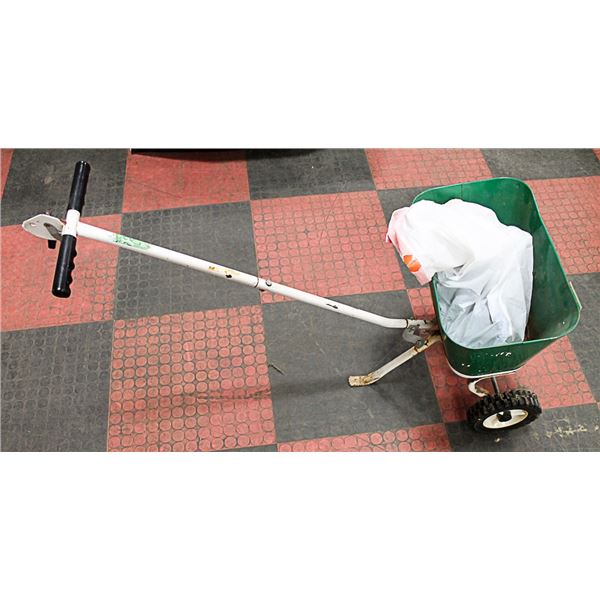 FERTILIZER SPREADER AND FLEXIBLE HOSE WITH NOZZLE