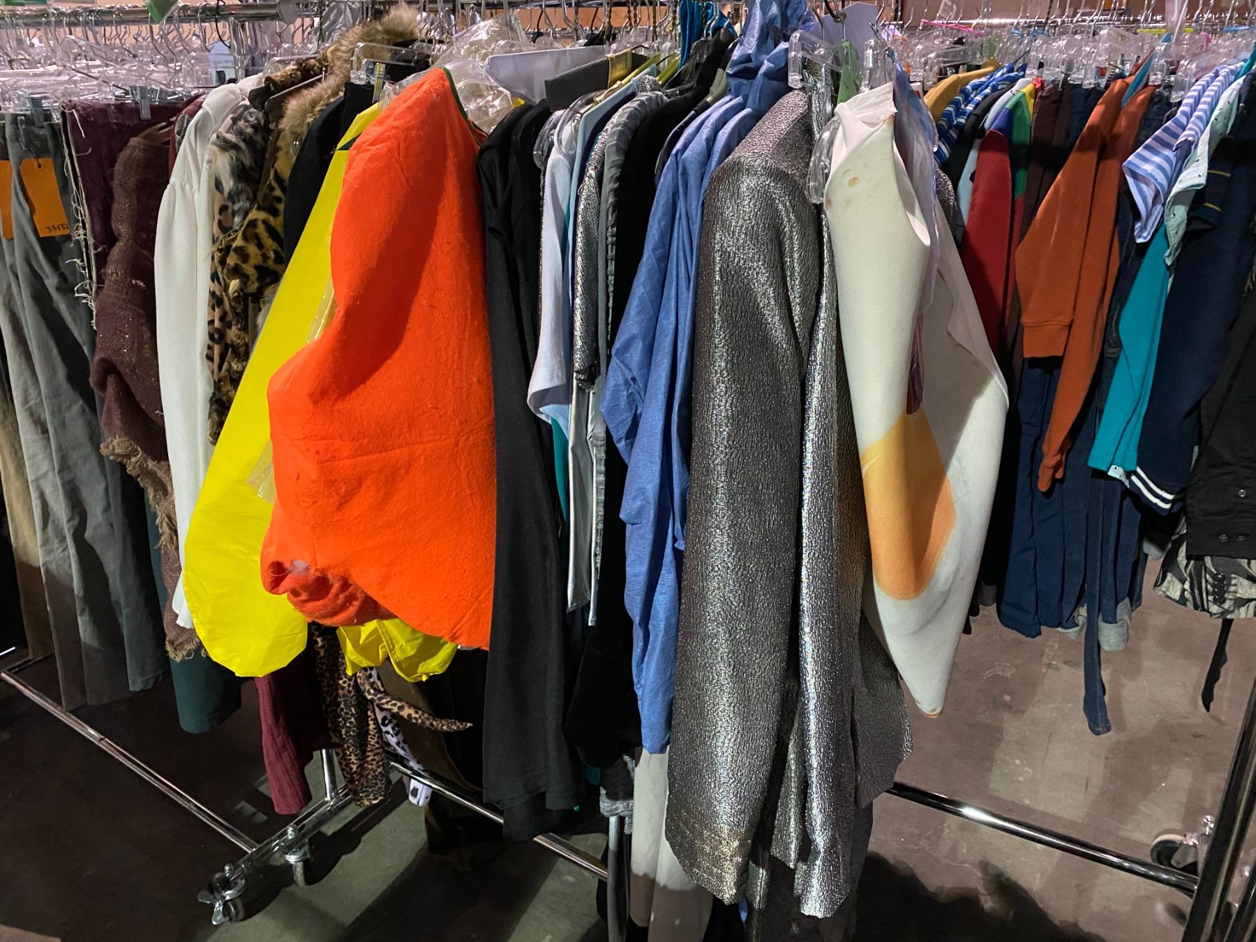 ASSORTED CLOTHING & COSTUMES RACK INCLUDED