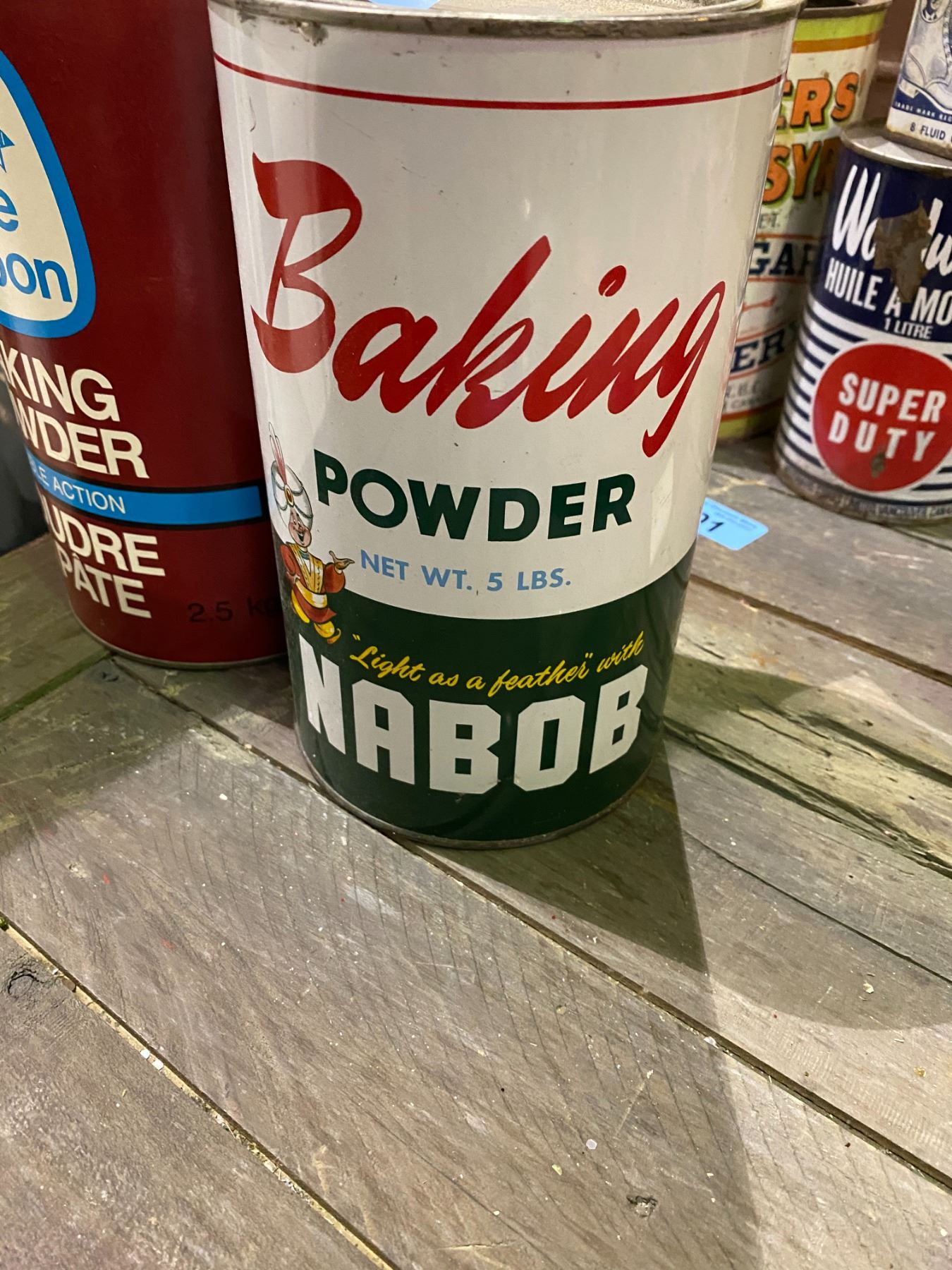2 Tin Cans (blue ribbon baking powder and nabob baking powder)