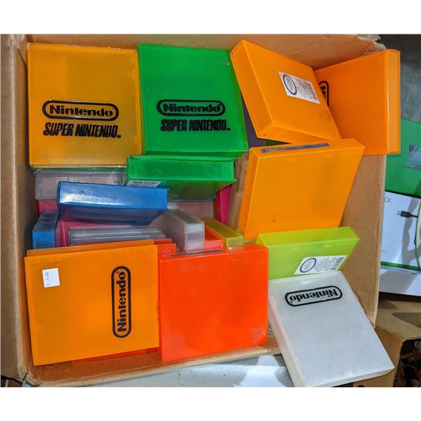 box of assorted Super Nintendo Nintendo plastic cases