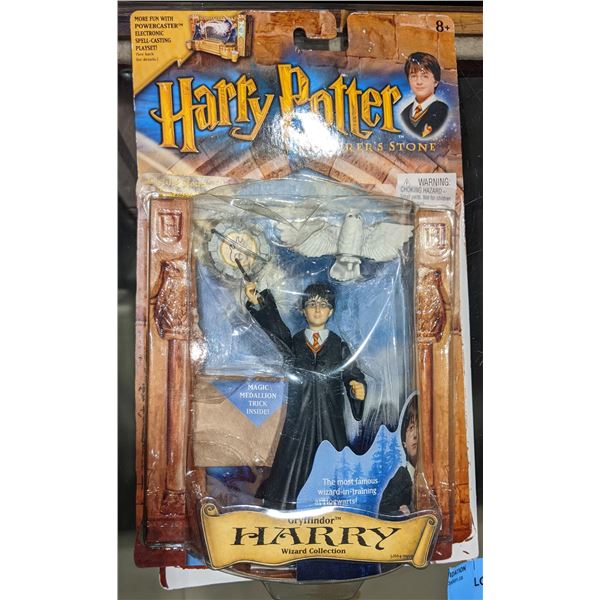 2 Collectibe Harry Potter and the Socerer's Stone action figures (Invisibility Cloak and Harry Potte