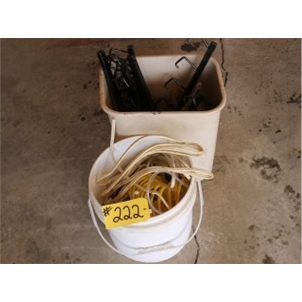 2 PAILS OF MISC HANGERS, WIRE, HOSE