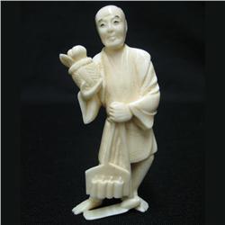 Early  20th C. carved ivory figurine of a
