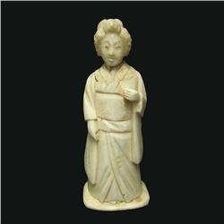 Early 20th C. carved ivory figurine of a w