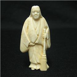 Early 20th C. carved ivory figurine of a m