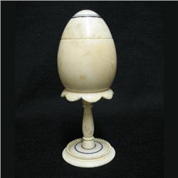 Early 20th C. ivory sewing egg and needle