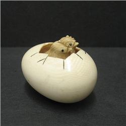 Early 20th C. carved ivory egg netsuke wit